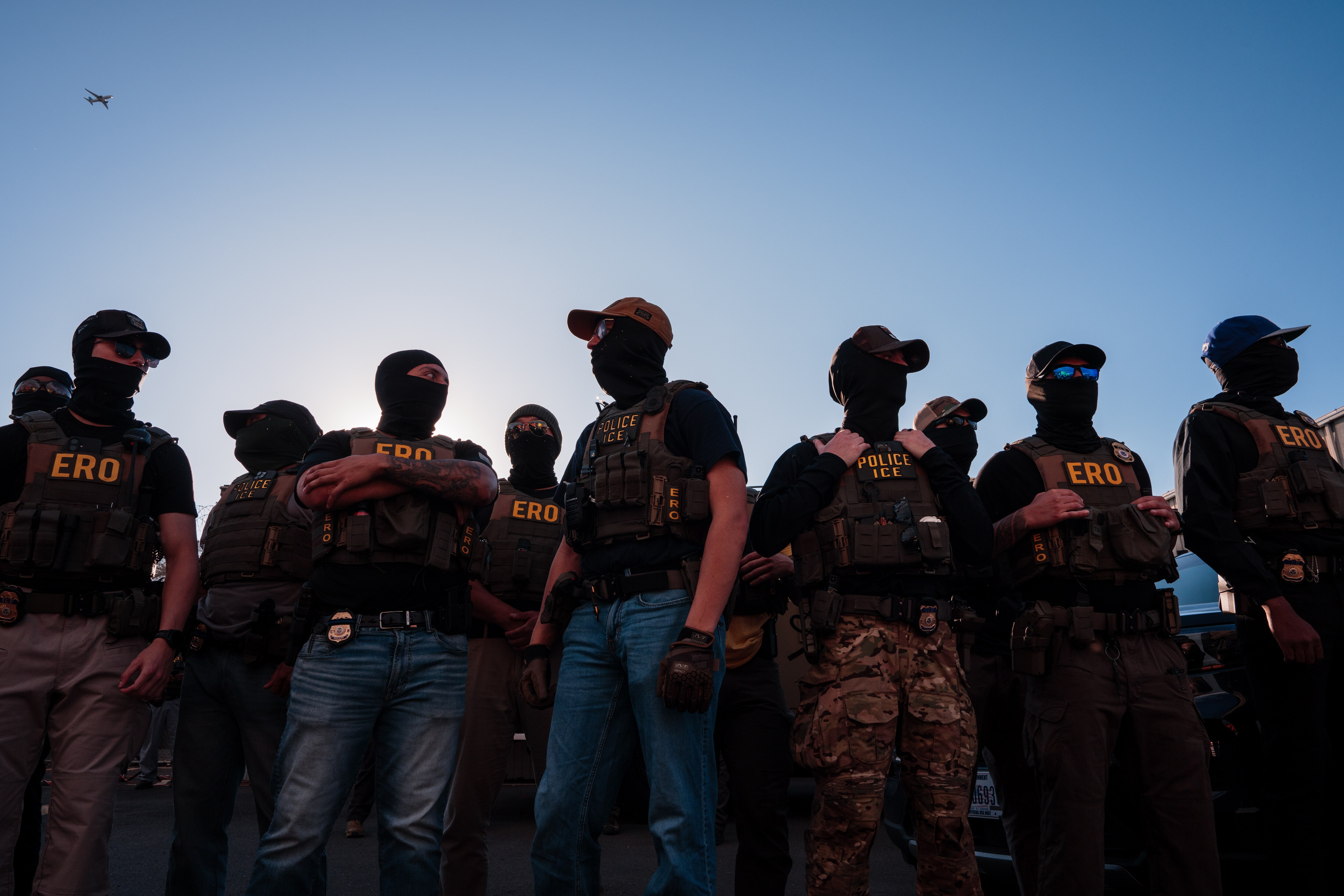 NEWARK, NEW JERSEY - MAY 28: ICE agents stand guard outside of the federal immigration center at Delaney Hall, where ICE is housing detained immigrants, on May 28, 2026 in Newark, New Jersey. The ongoing protests, which became tense over the holiday weekend, come amid reports of a hunger strike by detainees.