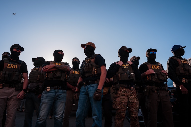 NEWARK, NEW JERSEY - MAY 28: ICE agents stand guard outside of the federal immigration center at Delaney Hall, where ICE is housing detained immigrants, on May 28, 2026 in Newark, New Jersey. The ongoing protests, which became tense over the holiday weekend, come amid reports of a hunger strike by detainees.