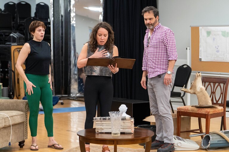 Siblings (from left to right, played by Kimberly Gilbert, Dina Thomas and Cody Nickell) discover a photo album at their late father’s home that forces them to reckon with their family’s racist past, in the Olney Theatre’s latest show, the Tony-winning play “Appropriate,”