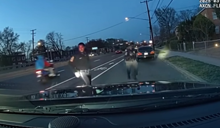Seat Pleasant Police Department officers run to their car after a car they stopped for a traffic violation in March 2025 sped away. The driver eventually crashed into other cars, killing a woman.