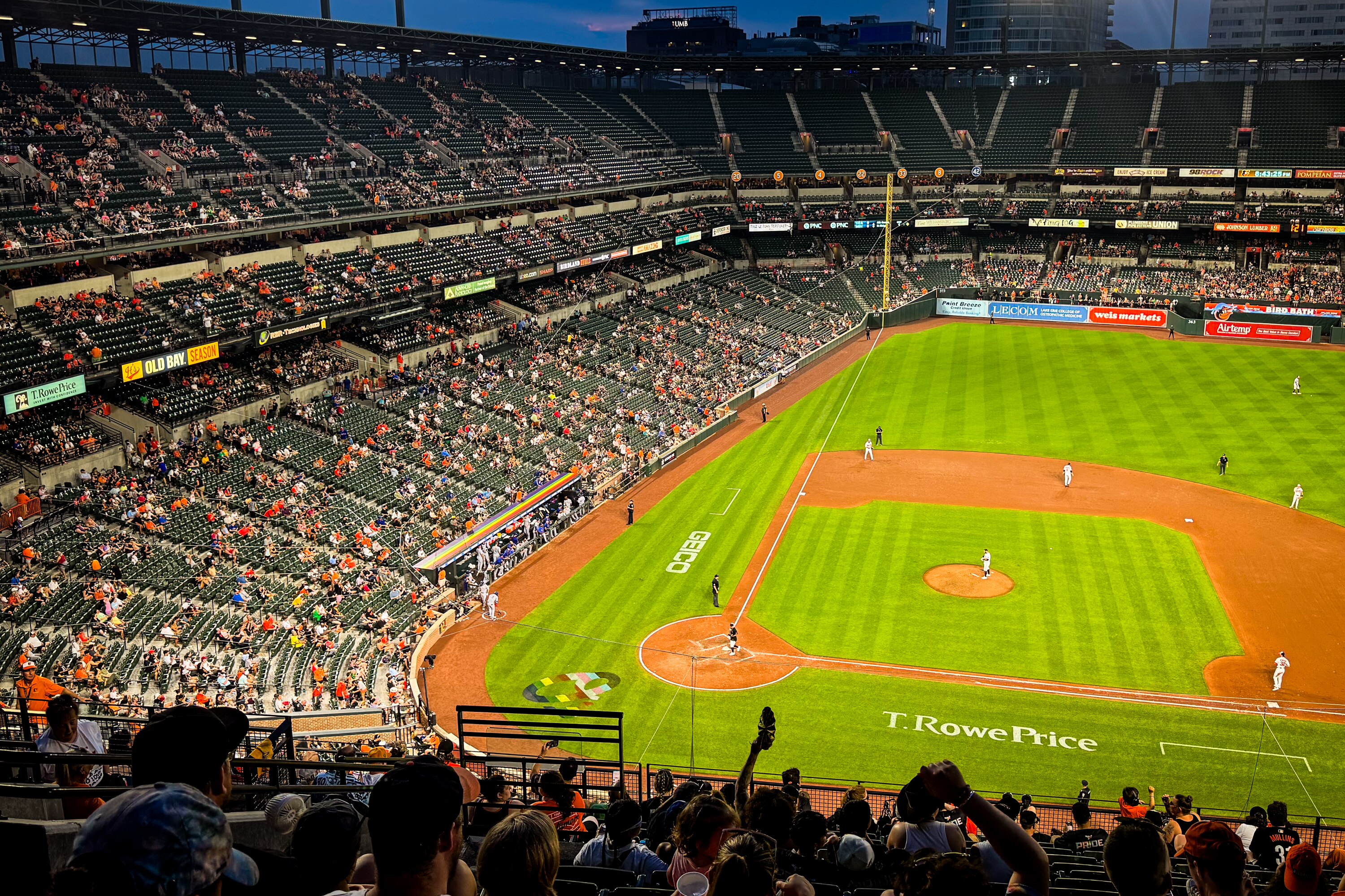 The Texas Rangers’ dugout is decorated with a rainbow as the Baltimore Orioles play the Texas Rangers at Orioles Park at Camden Yards in Baltimore during Pride Night on Wednesday, June 25, 2025.
