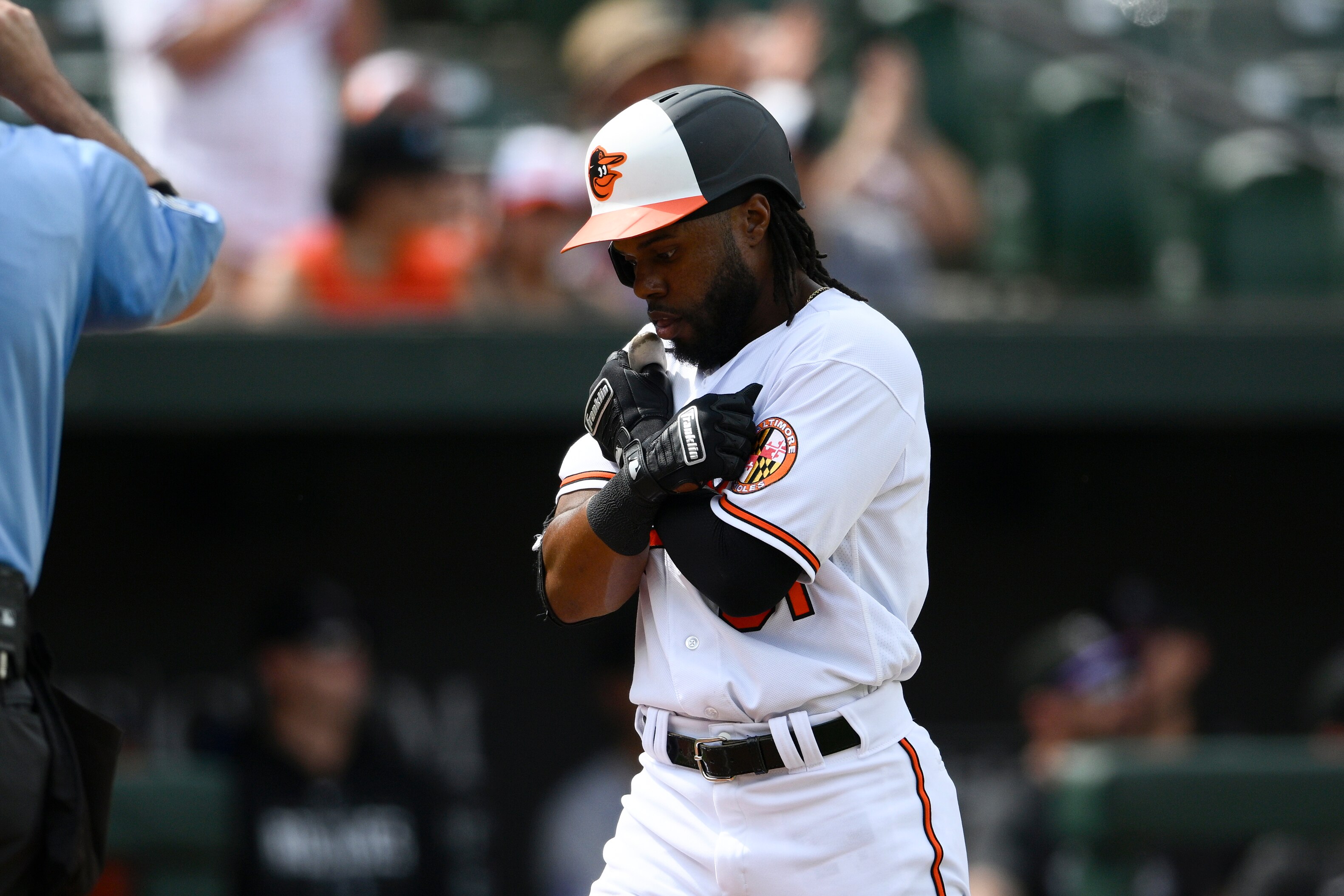 Cedric Mullins crosses the plate after hitting a fifth-inning homer for the Orioles' first run in Sunday's 4-3 loss to Colorado.