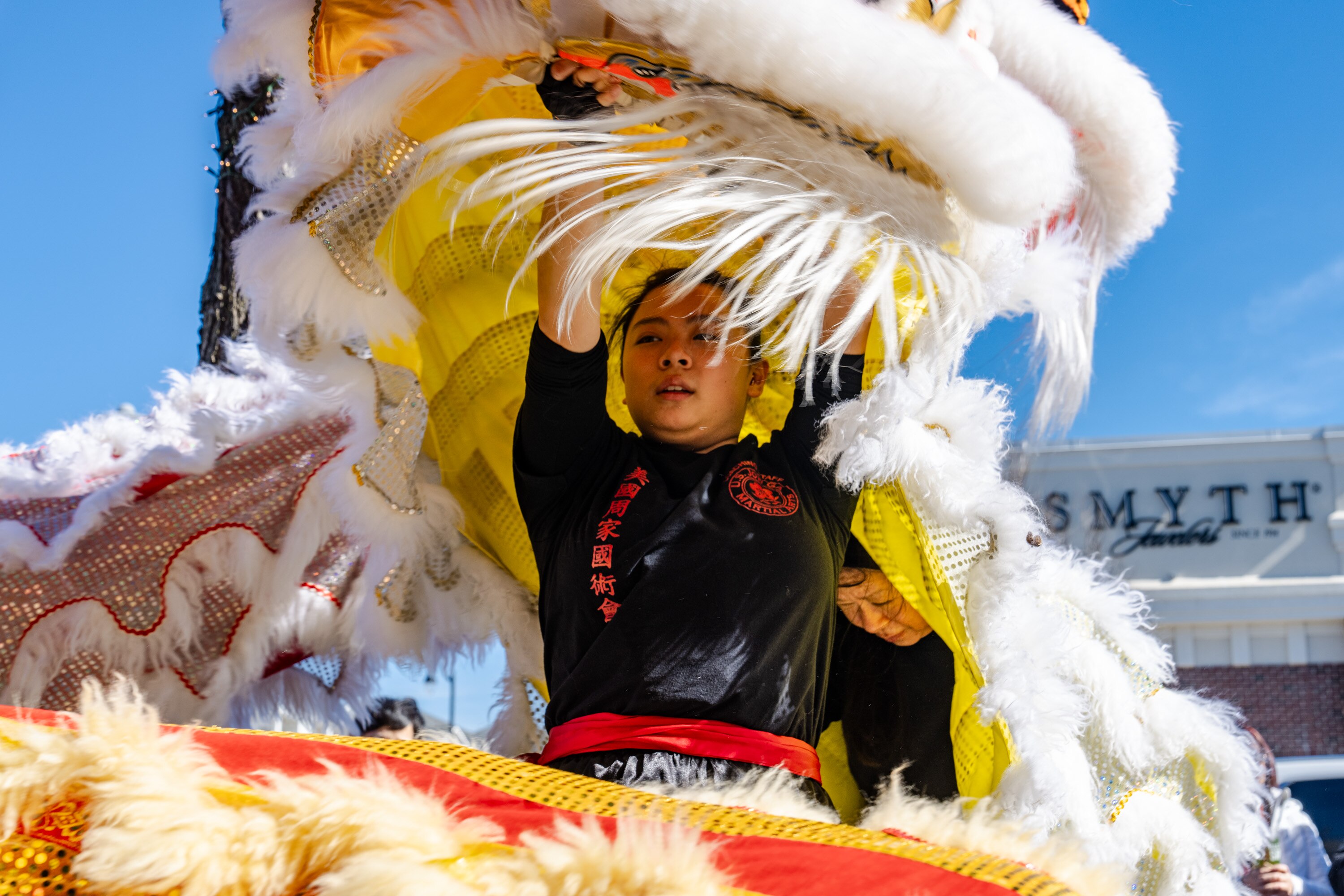 Emily Lam plays the lion head as her mom, Winnie Lam, plays the tail during a performance at Asian Court in Ellicott City on Sunday, Feb. 18, 2024.