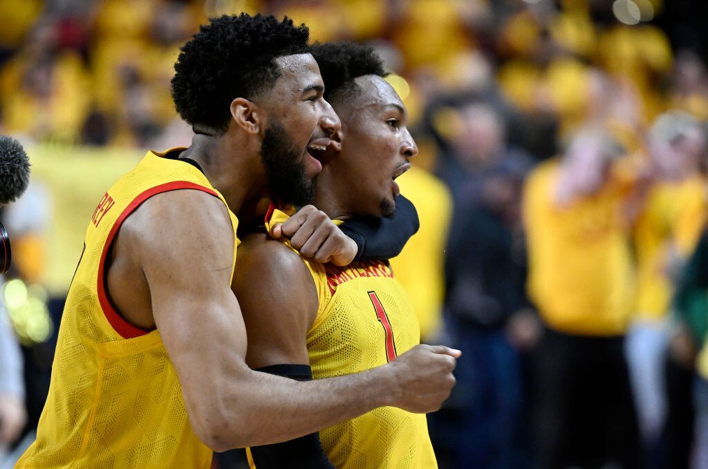 COLLEGE PARK, MARYLAND - DECEMBER 02: Jahmir Young #1 of the Maryland Terrapins celebrates with Don Carey #0 after a 71-66 victory against the Illinois Fighting Illini at Xfinity Center on December 02, 2022 in College Park, Maryland.
