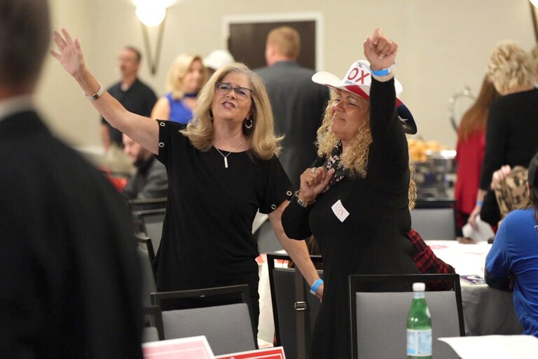 Chrissy Fulton, on left, shows support for gubernatorial candidate Dan Cox at his election night event held at DoubleTree by Hilton in Annapolis, Maryland, on Nov. 8, 2022.