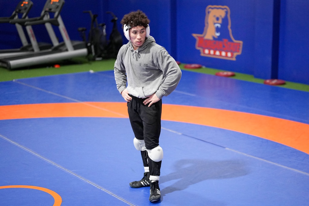 Eugene Harney rests for a moment during wrestling practice at Hill Field House on Morgan State University’s campus in Baltimore, Md., on Monday, March 16, 2026.