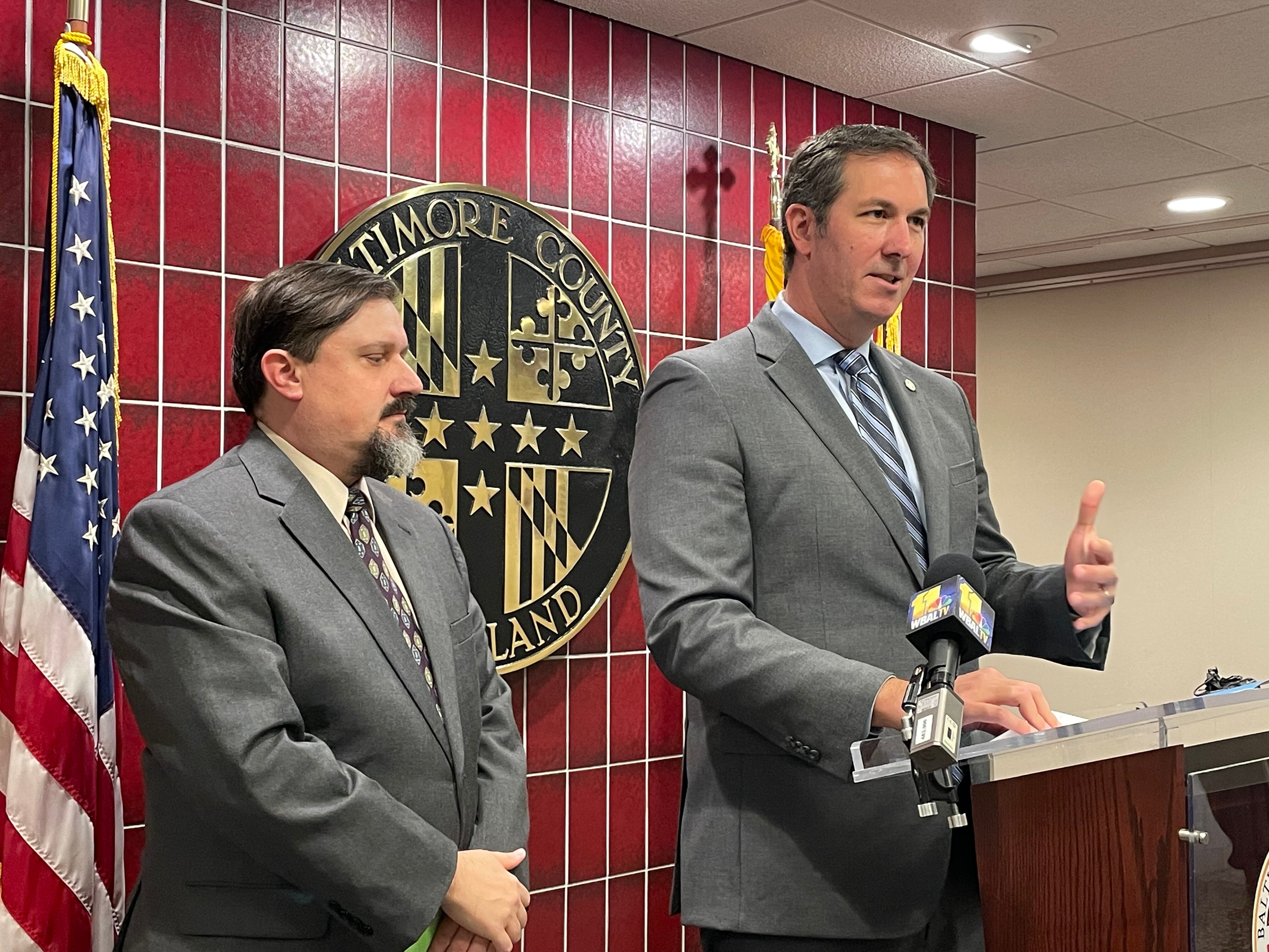 Baltimore County Executive Johnny Olszewski Jr. holds a press conference on Monday, Oct. 16, 2023, to announce proposals to strengthen the county inspector general's office. He also unveiled plaques that give additional information about former county executives Spiro Agnew and Dale Anderson, whose portraits hang in the Historic Courthouse in Towson. James Keffer, executive director of the Historical Society of Baltimore County, at left, researched the information for the plaques.