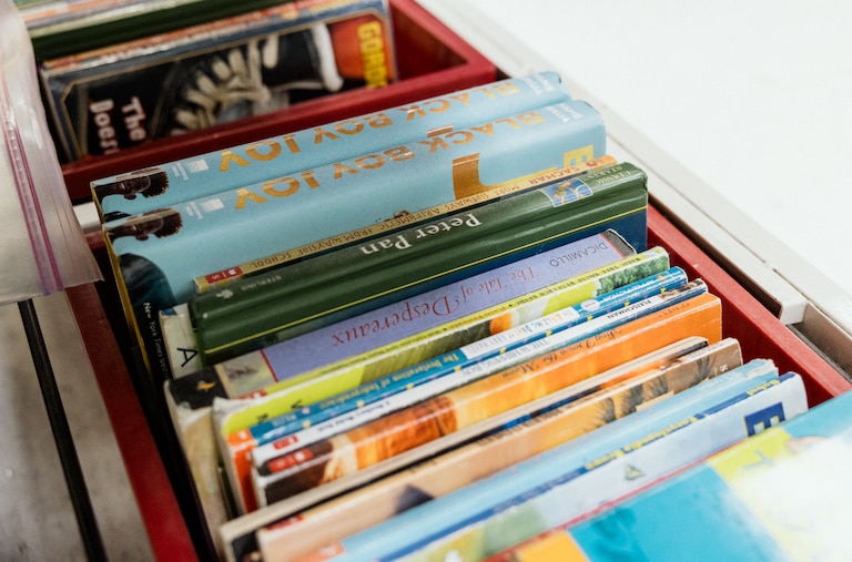 BALTIMORE, MD - DECEMBER 5, 2024: School books at a classroom in KIPP Harmony Academy are seen on December 5, 2024.