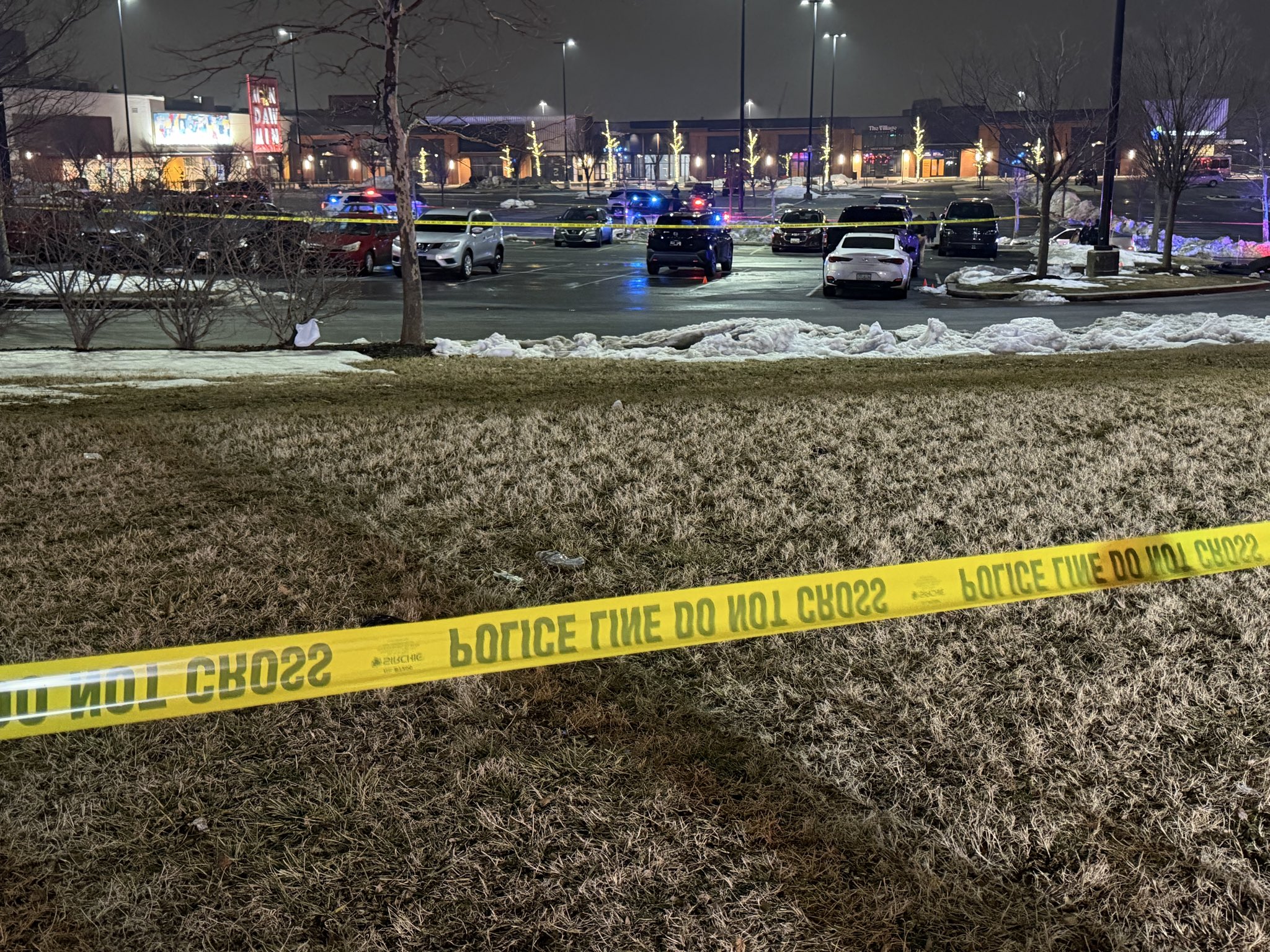 Baltimore police respond to a shooting with four victims in the 2400 block of Liberty Heights, near Mondawmin Mall, in the early hours of Tuesday morning.