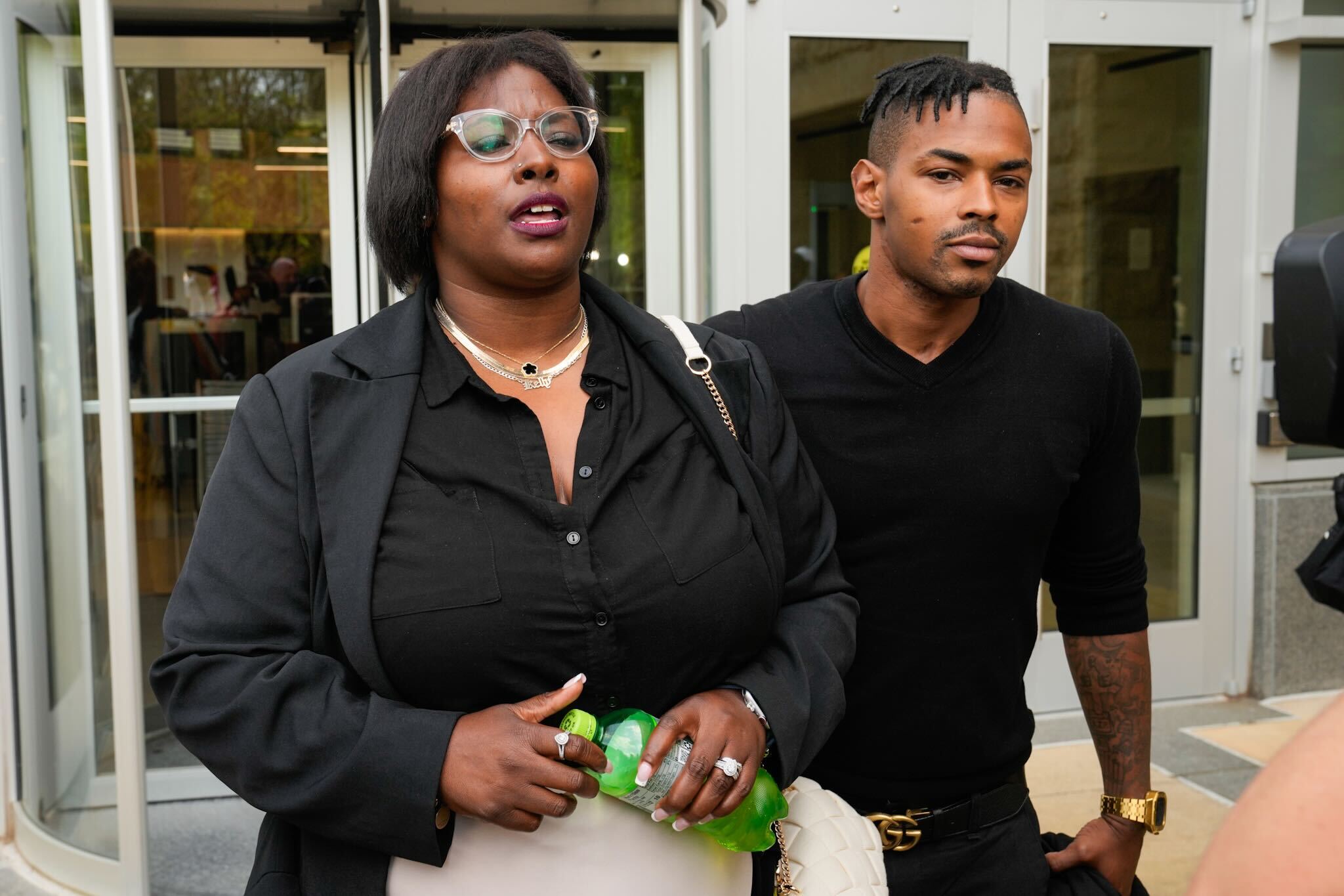 Kelly Davis and Keith Davis Jr., leave U.S. District Court after the sentencing of former Baltimore State's Attorney Marilyn Mosby, May 23, 2024.