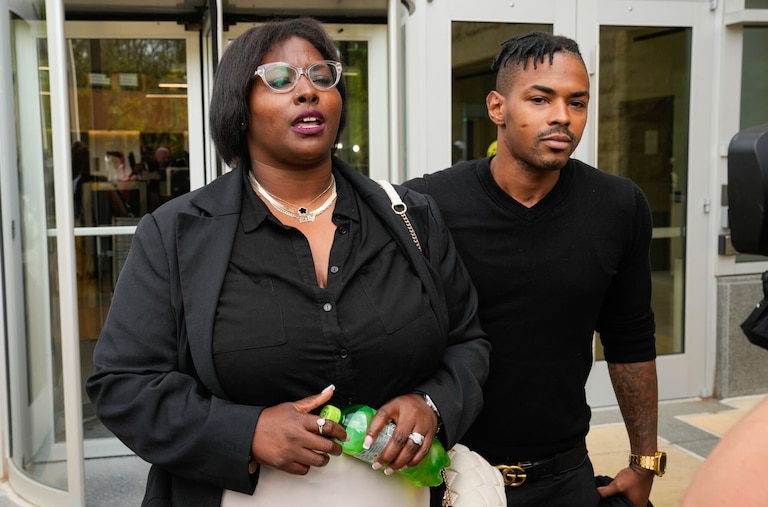 Kelly Davis and Keith Davis Jr., leave U.S. District Court after the sentencing of former Baltimore State's Attorney Marilyn Mosby, May 23, 2024.