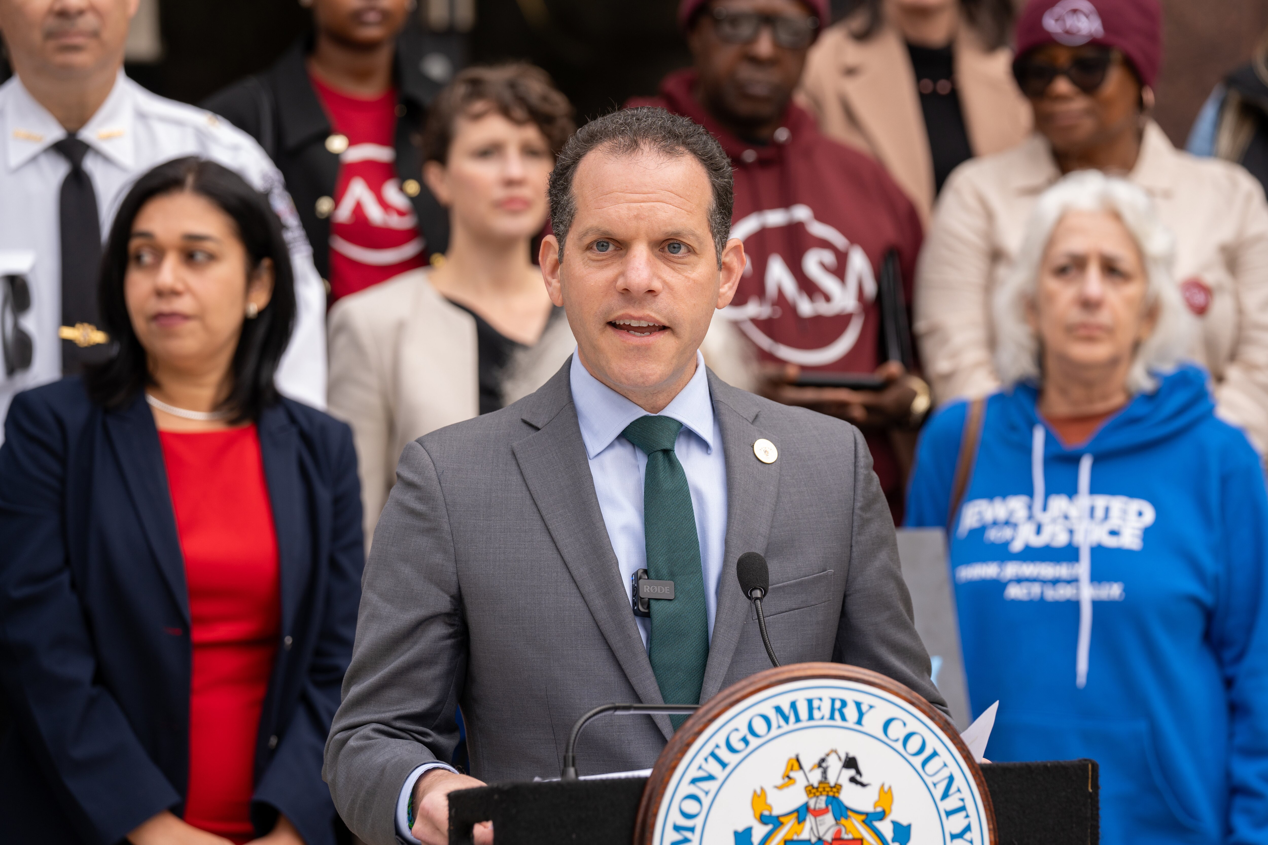 Montgomery County Councilmember Evan Glass, here at a press event in 2024, has raised $87,206 to qualify for $375,540 in matching funds in the race for Montgomery County executive.