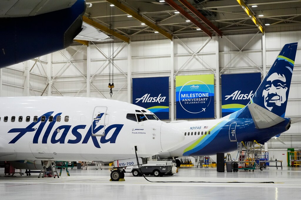 Alaska Airlines aircraft sits in the airline's hangar at Seattle-Tacoma International Airport, Jan. 10, 2024, in SeaTac, Wash. (AP Photo/Lindsey Wasson, File)