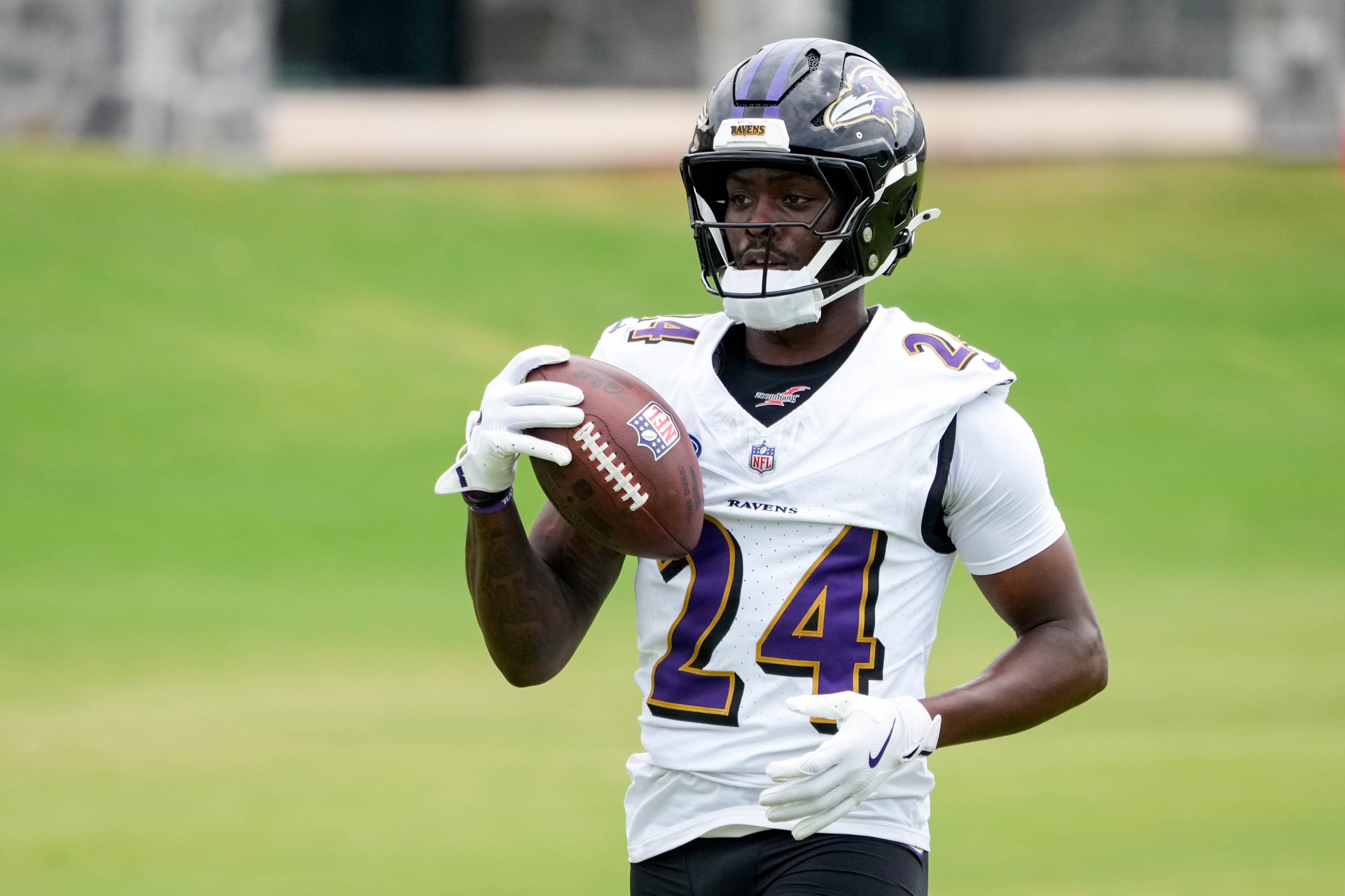 Baltimore Ravens safety Malaki Starks (24) catches a pass during the team’s training camp session at the Under Armour Performance Center in Owings Mills, Md. on Thursday, July 24, 2025.