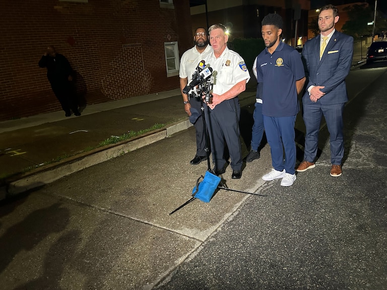 Baltimore Police Commissioner Richard Worley and Mayor Brandon Scott hold a press conference Wednesday, Mary 27, 2026, after a double shooting left a child and adult injured.