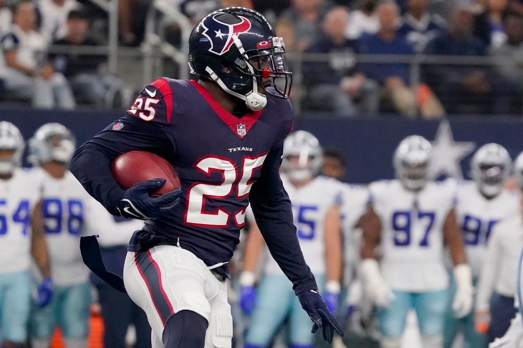 Desmond King II of the Houston Texans runs the ball during the first half against the Dallas Cowboys on Dec. 11, 2022.