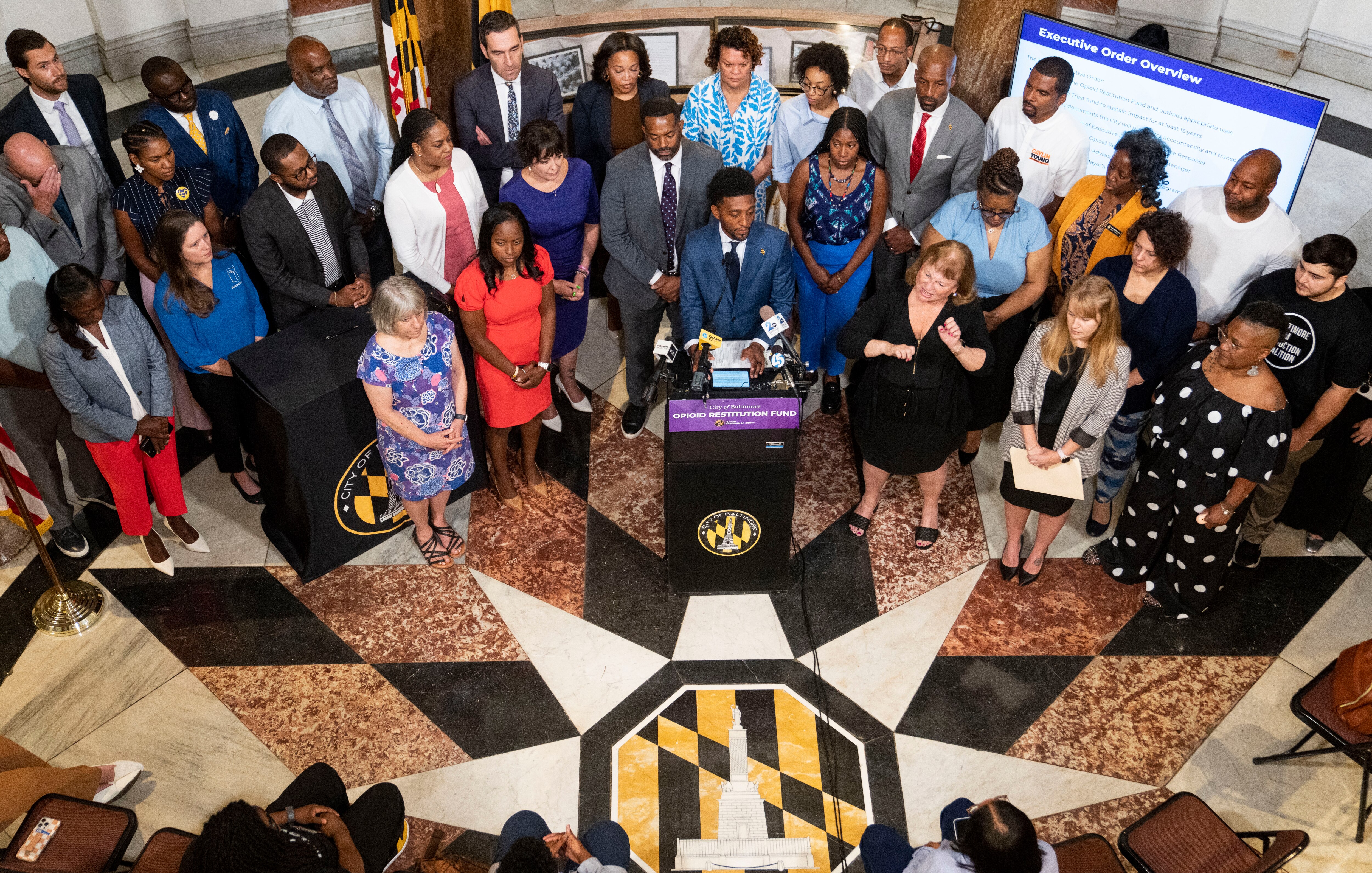 Mayor Brandon Scott at a press conference at Baltimore City Hall last summer laid out his plans for managing the money won from pharmaceutical companies as part of ongoing opioid litigation.