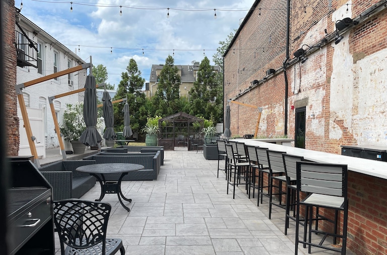 The courtyard between the Atlas-owned Waterfront Hotel and 1704 Thames St. in Fells Point.