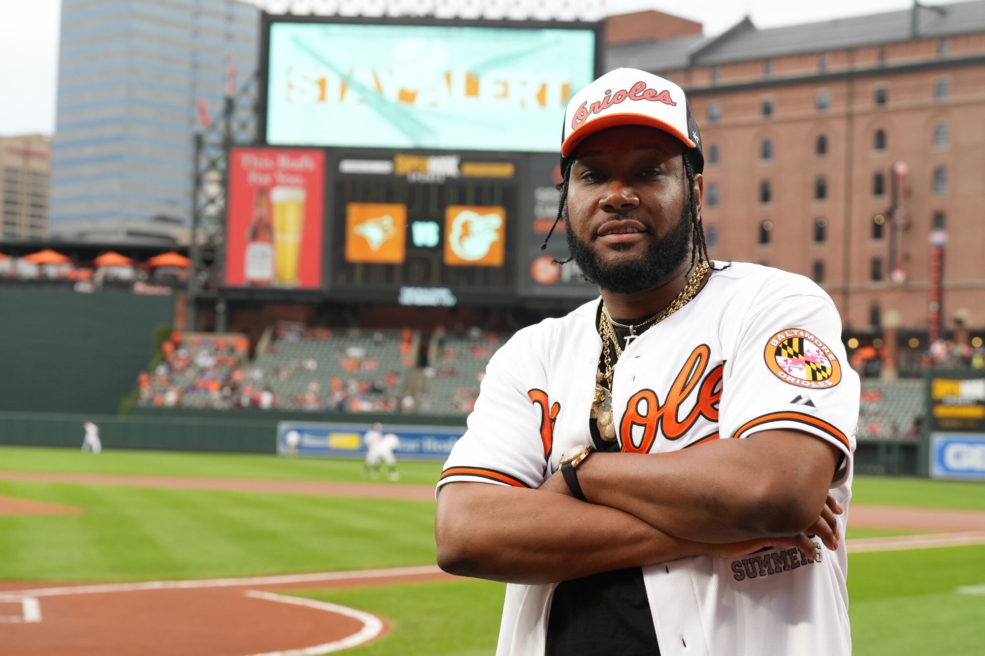 Bossman poses for a portrait at Camden Yards before throwing the first pitch Wednesday night.