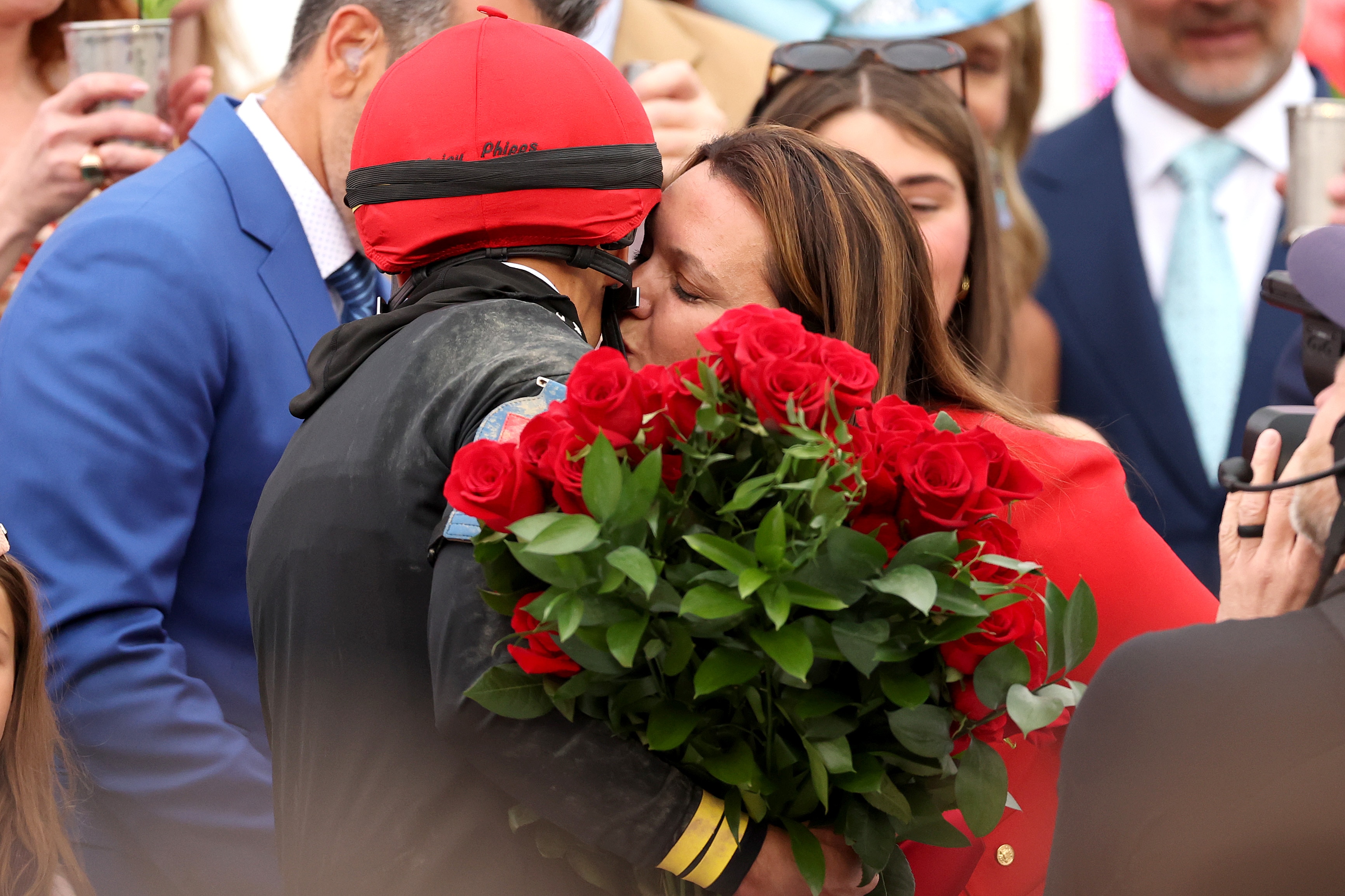 Jockey Jose Ortiz and trainer Cherie DeVaux embrace after Golden Tempo won Saturday’s Kentucky Derby.