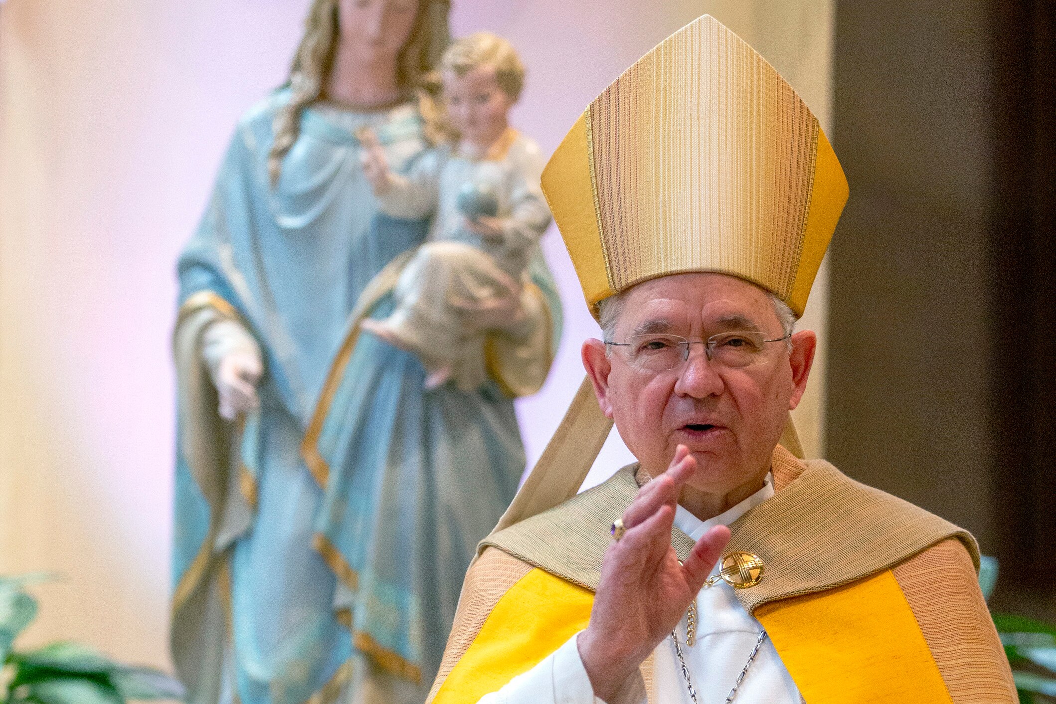 In this Friday, May 1, 2020 file photo, Archbishop Jose H. Gomez gives a blessing after leading a brief liturgy at the Cathedral of Our Lady of the Angels in Los Angeles. (AP Photo/Damian Dovarganes, Pool)