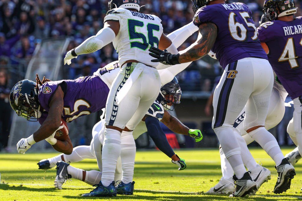 Gus Edwards #35 of the Baltimore Ravens rushes for a touchdown against the Seattle Seahawks during the second quarter at M&T Bank Stadium on Nov. 5, 2023, in Baltimore.