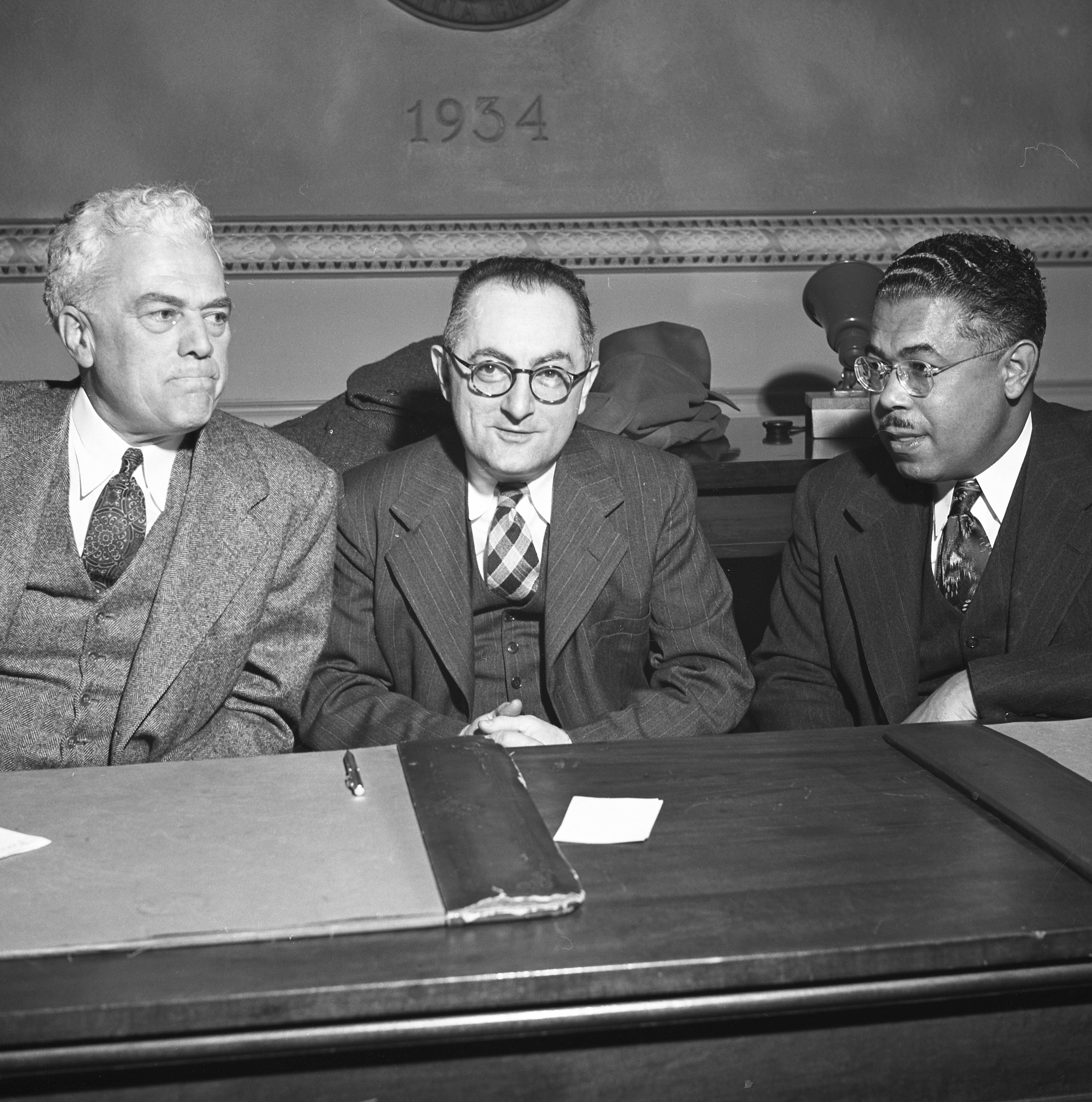 Noah Hillman, center, with Arthur Ellington, left, and an unidentified man at a City Hall meeting in the late 1950s. Both Hillman and Ellington were members of the city council who served brief tenures as interim mayor.