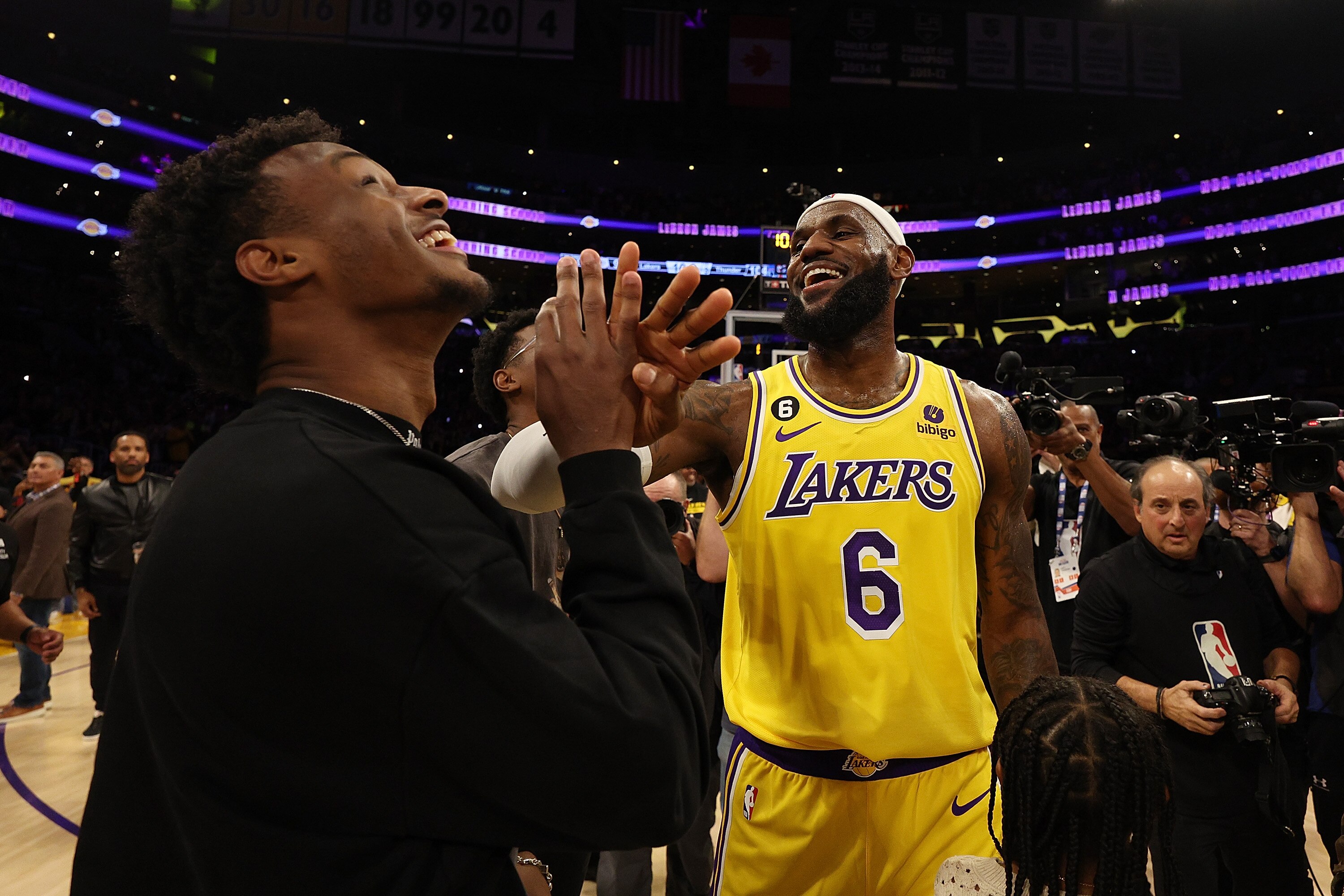 LeBron James of the Los Angeles Lakers celebrates with his son Bronny after becoming the NBA's all-time leading scorer last season.