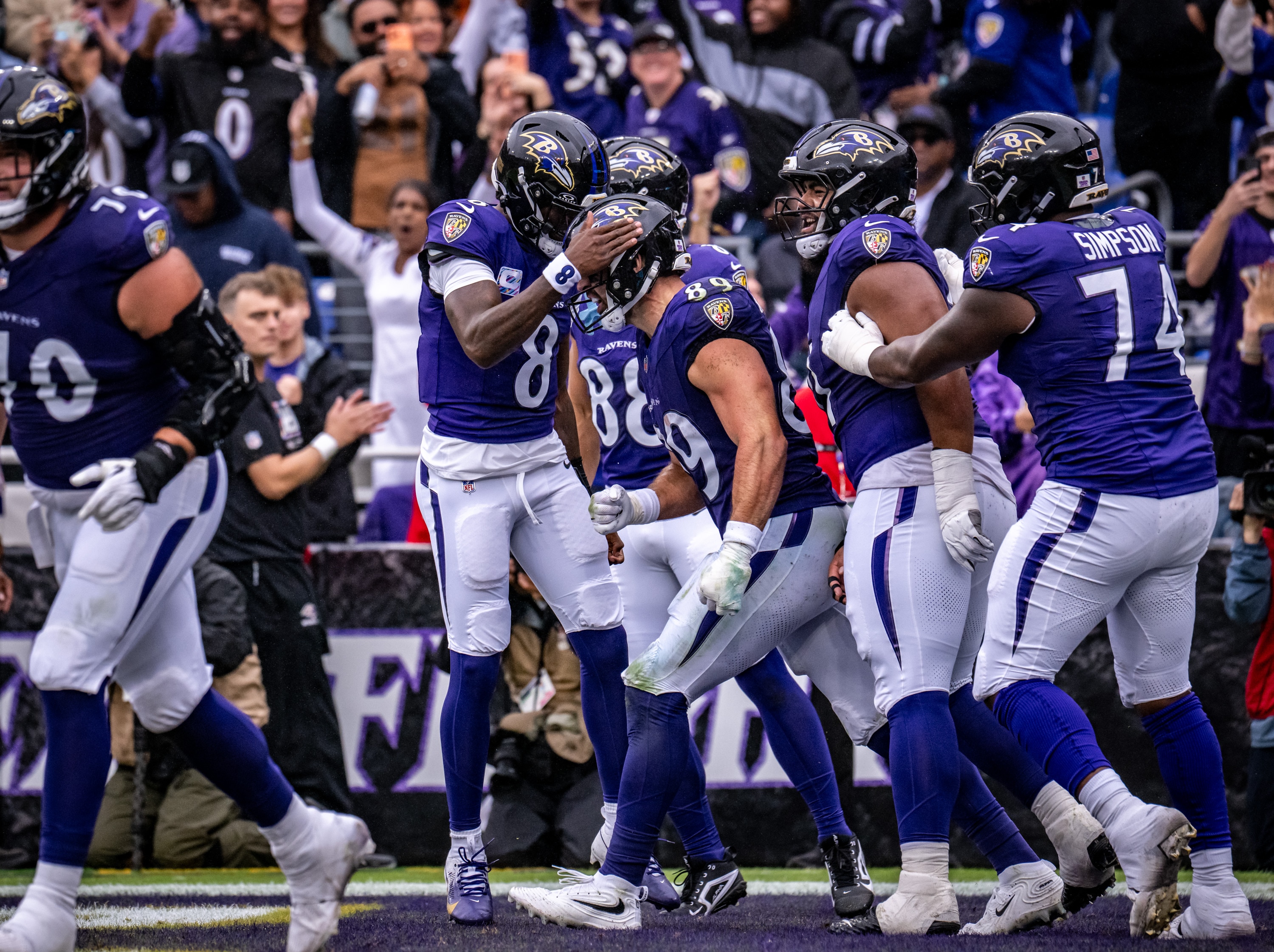 Ravens quarterback Lamar Jackson (8) celebrates tight end Mark Andrews' (89) touchdown in the team's game against the Tennessee Titans on Oct. 4.