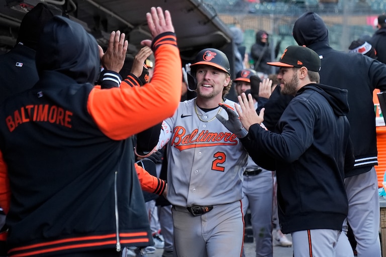 Orioles designated hitter Gunnar Henderson celebrates after hitting a two-run home run during the eighth inning.