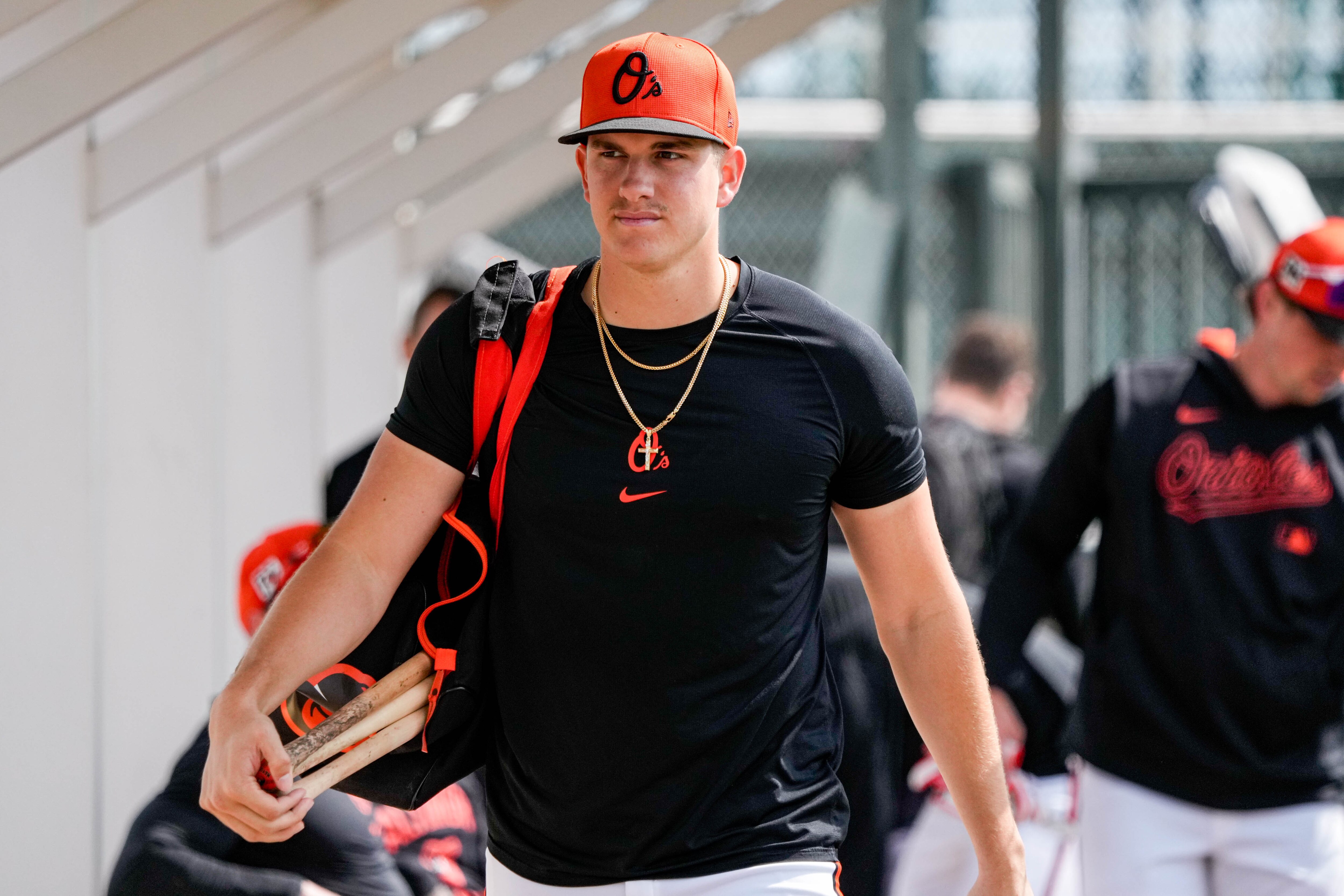 Baltimore Orioles infielder Coby Mayo leaves the practice fields after batting practice at spring training last month.