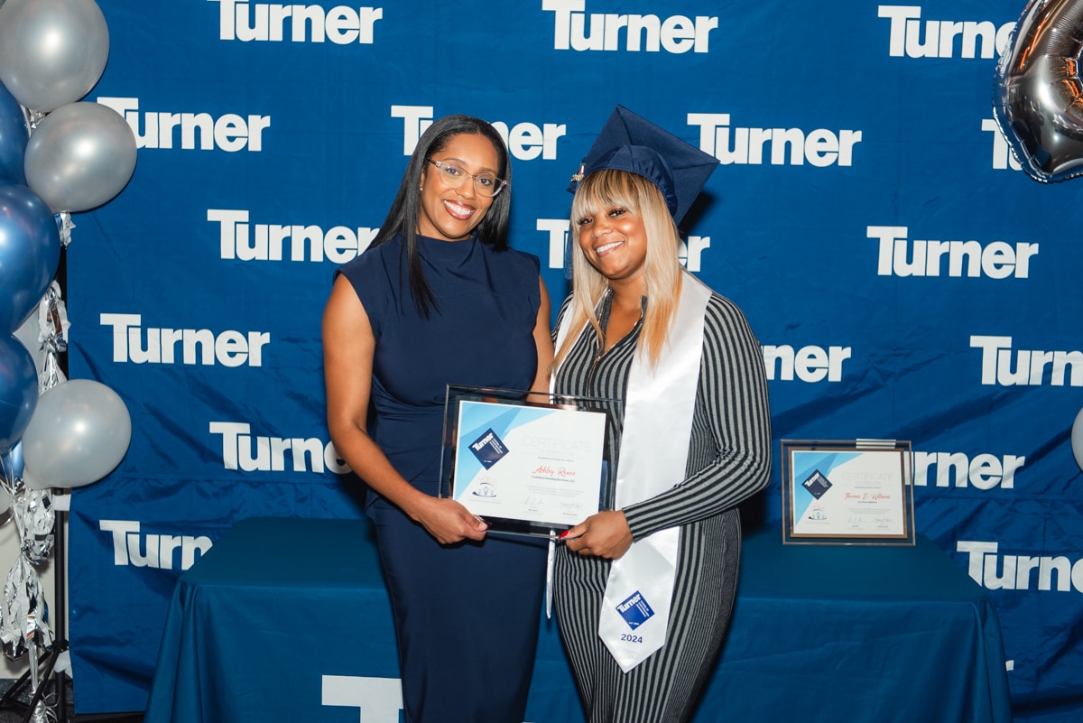 Turner Community & Citizenship Program Specialist Brittany Lewis with Ashley Renee, owner of Confident Cleaning, at the 2024 Turner School of Construction Management graduation.