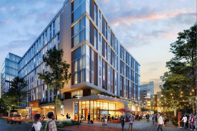 A rendering of the south quad shows new development planned by the University of Maryland, Baltimore for residential buildings, restaurant space and outdoor areas.