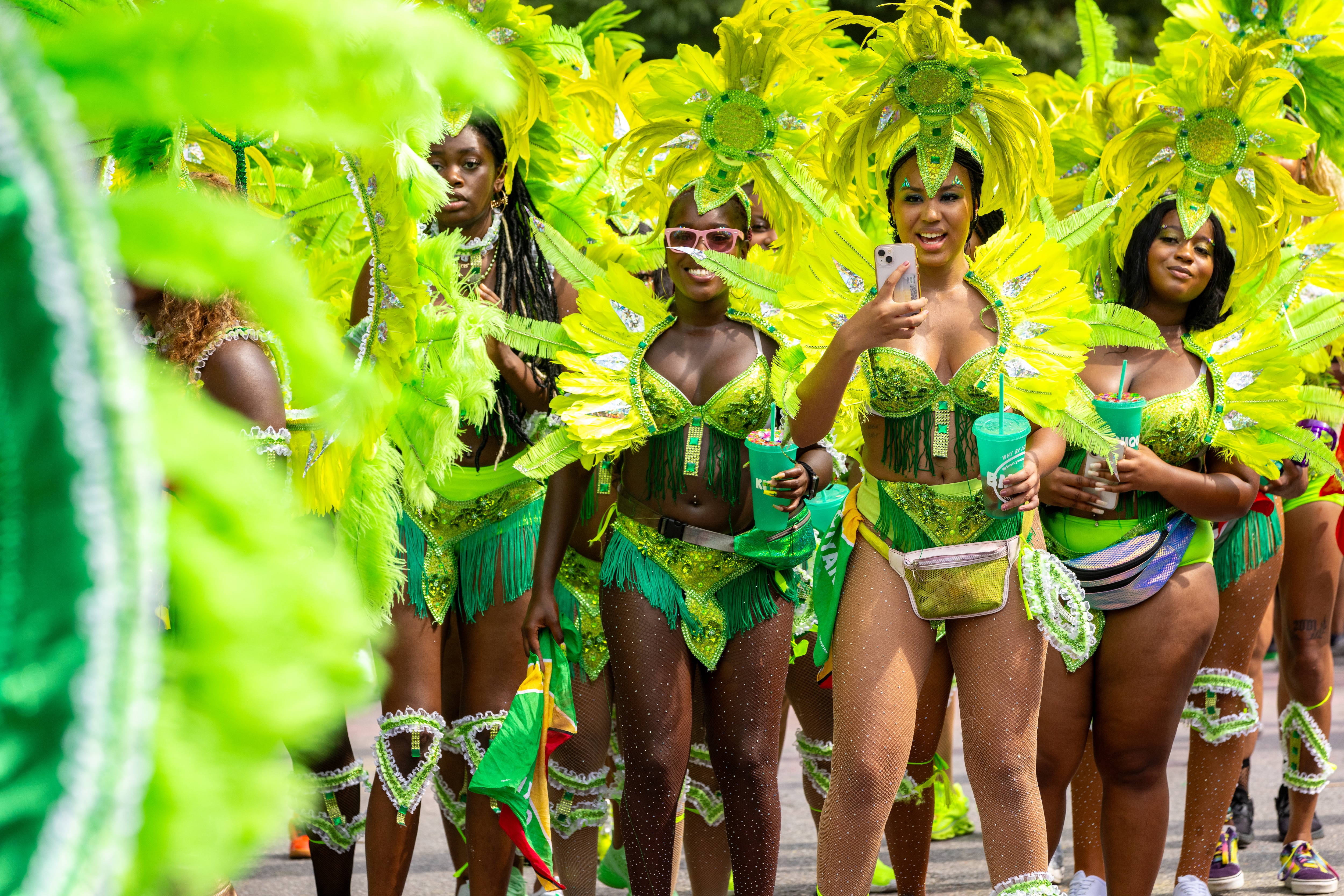 Mas players cheering on a friend at the judging point of the annual Baltimore Washington ONE Carnival in Baltimore, MD on Saturday, July 8, 2023.