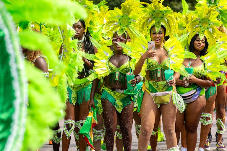 Mas players cheering on a friend at the judging point of the annual Baltimore Washington ONE Carnival in Baltimore, MD on Saturday, July 8, 2023.
