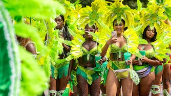 Mas players cheering on a friend at the judging point of the annual Baltimore Washington ONE Carnival in Baltimore, MD on Saturday, July 8, 2023.