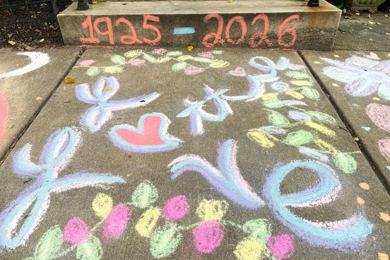 Neighbors' tribute to Lottie Shivers on the sidewalk in front of her house in Bolton Hill in August.