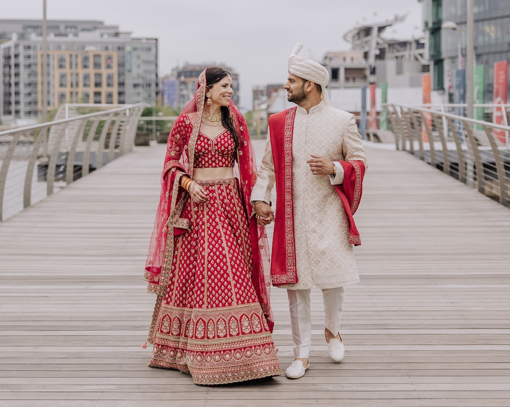 Audrey and Vikesh Patel walk hand-in-hand on their wedding day in 2024, nine months before Vikesh died in a plane crash.