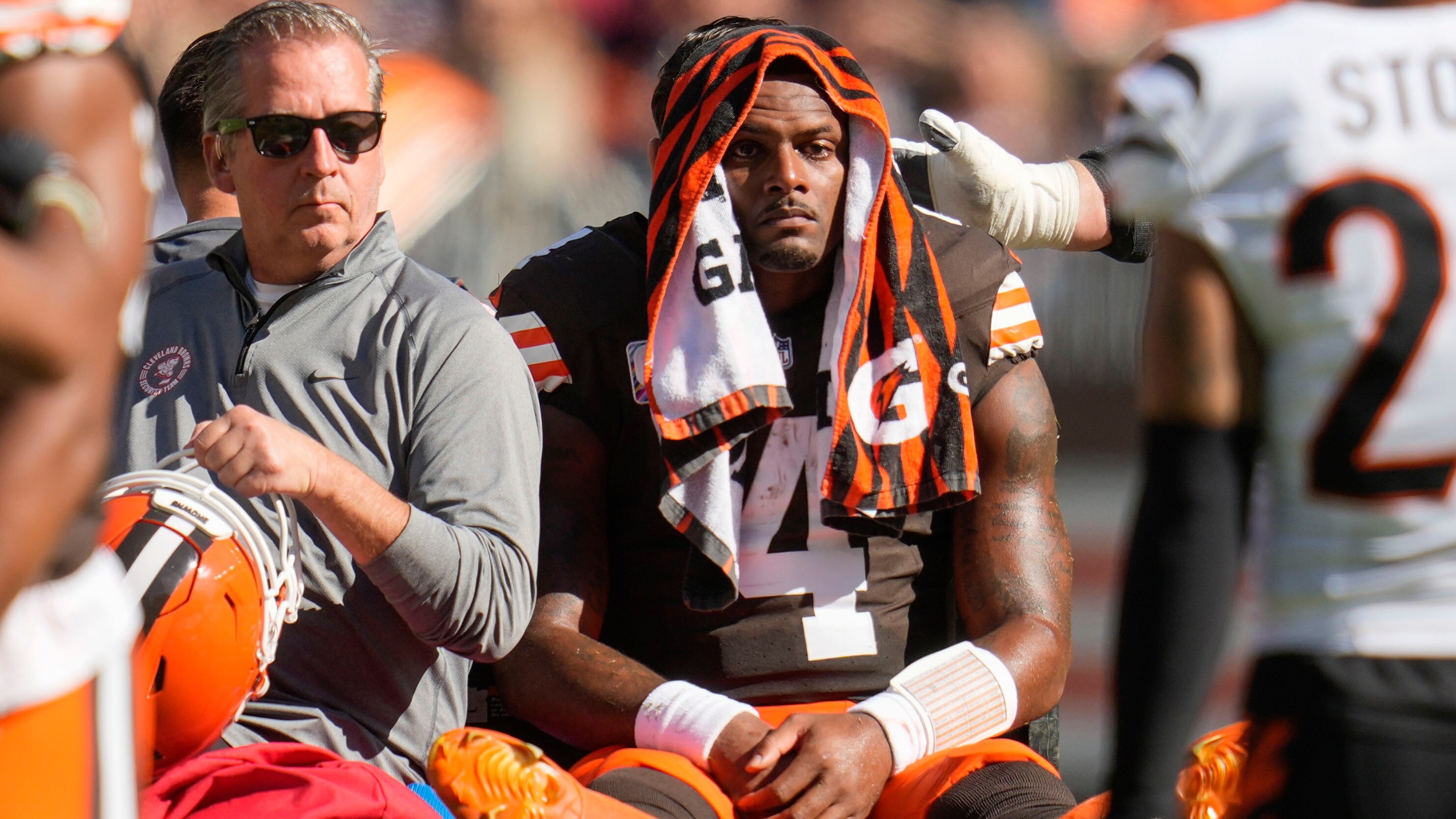 Cleveland Browns quarterback Deshaun Watson (4) is carted off the field after being injured in the first half of an NFL football game against the Cincinnati Bengals, Sunday, Oct. 20, 2024, in Cleveland. (AP Photo/Sue Ogrocki)