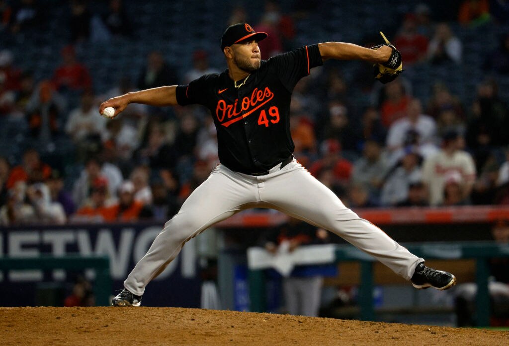 ANAHEIM, CALIFORNIA - APRIL 22: Starting pitcher Albert Suárez #49 of the Baltimore Orioles throws against the Los Angeles Angels during the fourth inning. (Photo by Kevork Djansezian/Getty Images)