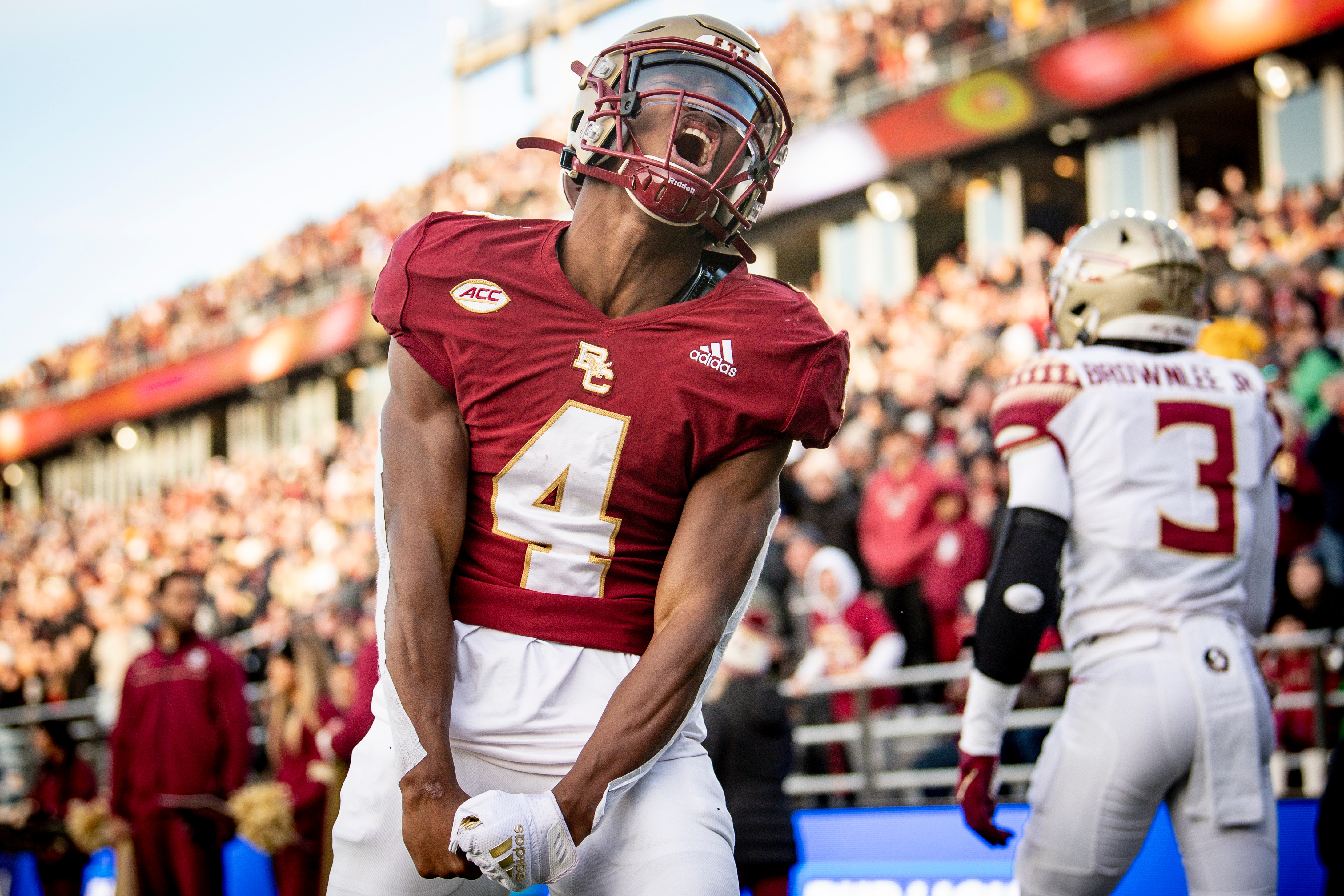CHESTNUT HILL, MASSACHUSETTS - NOVEMBER 20: Zay Flowers #4 of the Boston College Eagles reacts after scoring a touchdown during the third quarter against the Florida State Seminoles at Alumni Stadium on November 20, 2021 in Chestnut Hill, Massachusetts.