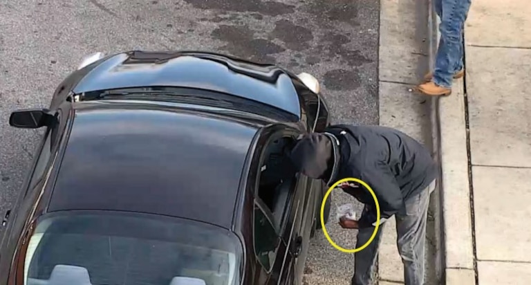 A man FBI agents identified as Abdallah Simms allegedly sells cocaine to a confidential informant working with investigators on Clay Street. The Dec. 21 drug sale was captured by video camera.