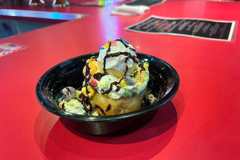 A Lucky Charms donut treat from Day & Night Exotic Cereal Bar.