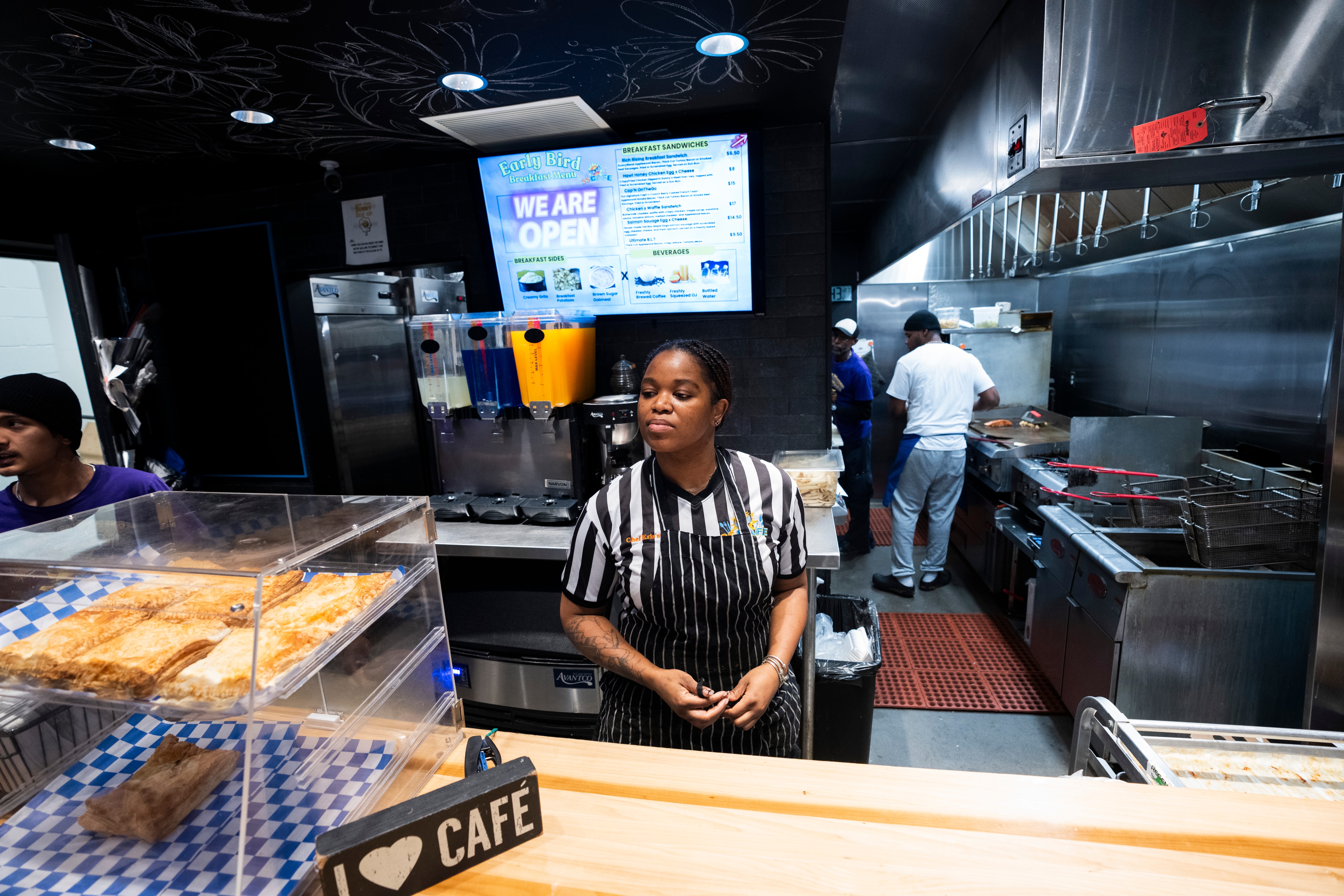 Sunny Side Café co-owner Kristian Knight-Miller behind the counter at her stall in Lexington Market.