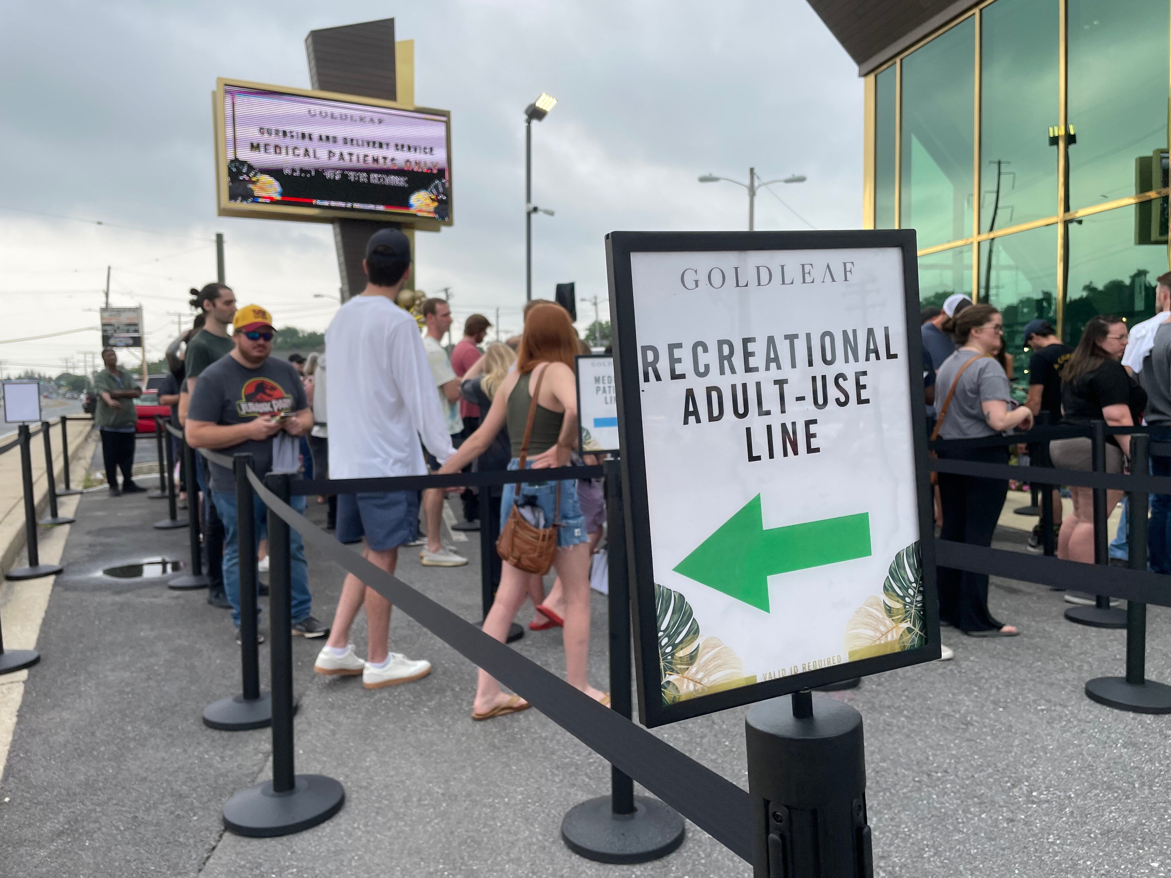 Lines form at Gold Leaf dispensary in Annapolis. State law effective Saturday requires dispensaries give priority service to medical patients either by providing a separate line or reserving dedicated shopping hours.