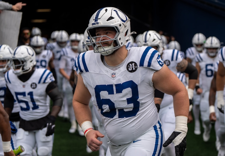 Indianapolis Colts center Danny Pinter runs on to the field before a game against the Seattle Seahawks on Dec. 14, 2025.