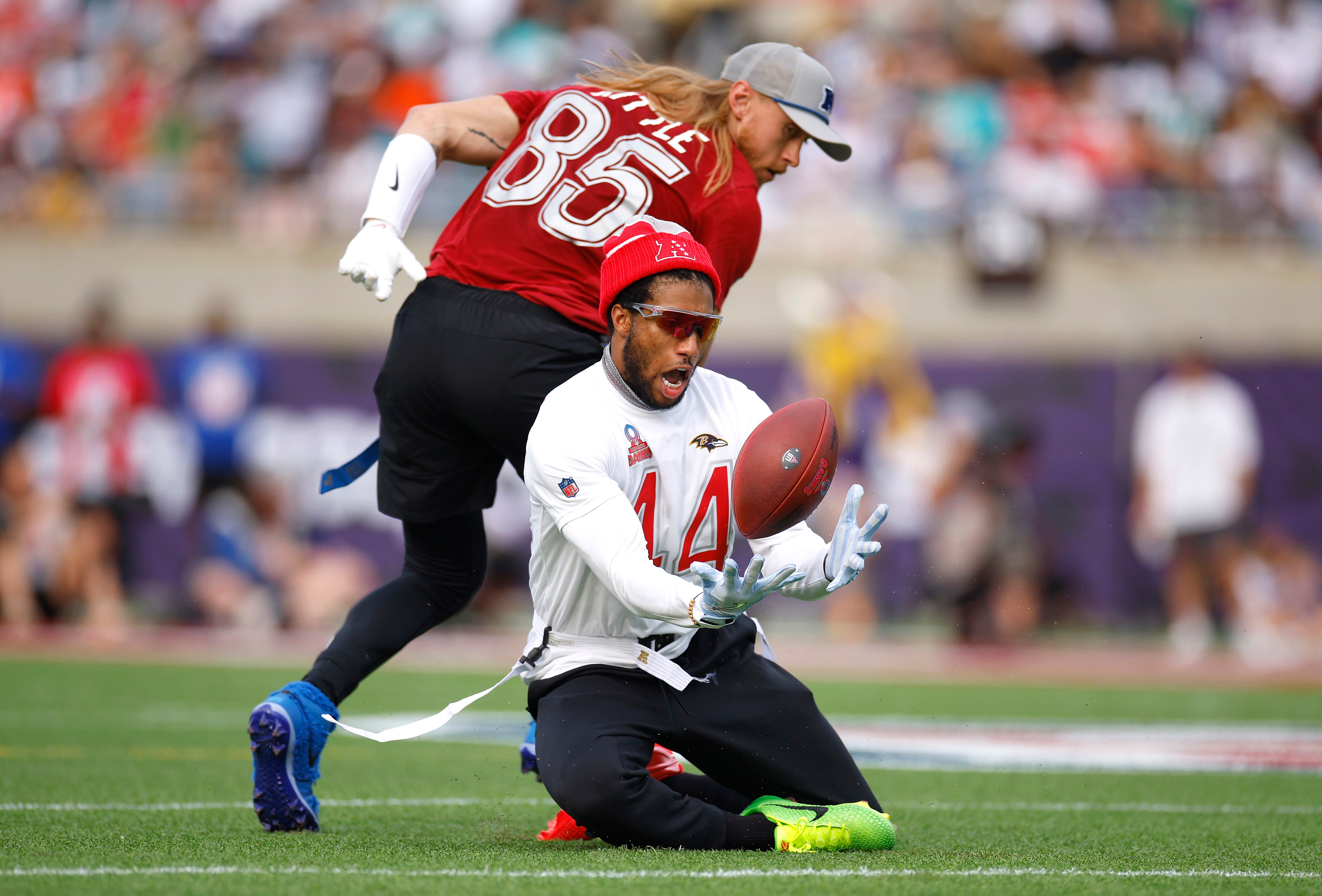 Marlon Humphrey of the Ravens intercepts a pass intended for George Kittle of the San Francisco 49ers during the second quarter Sunday.