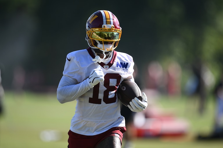 Washington Commanders wide receiver Stefon Diggs works out during practice on Aug. 7.