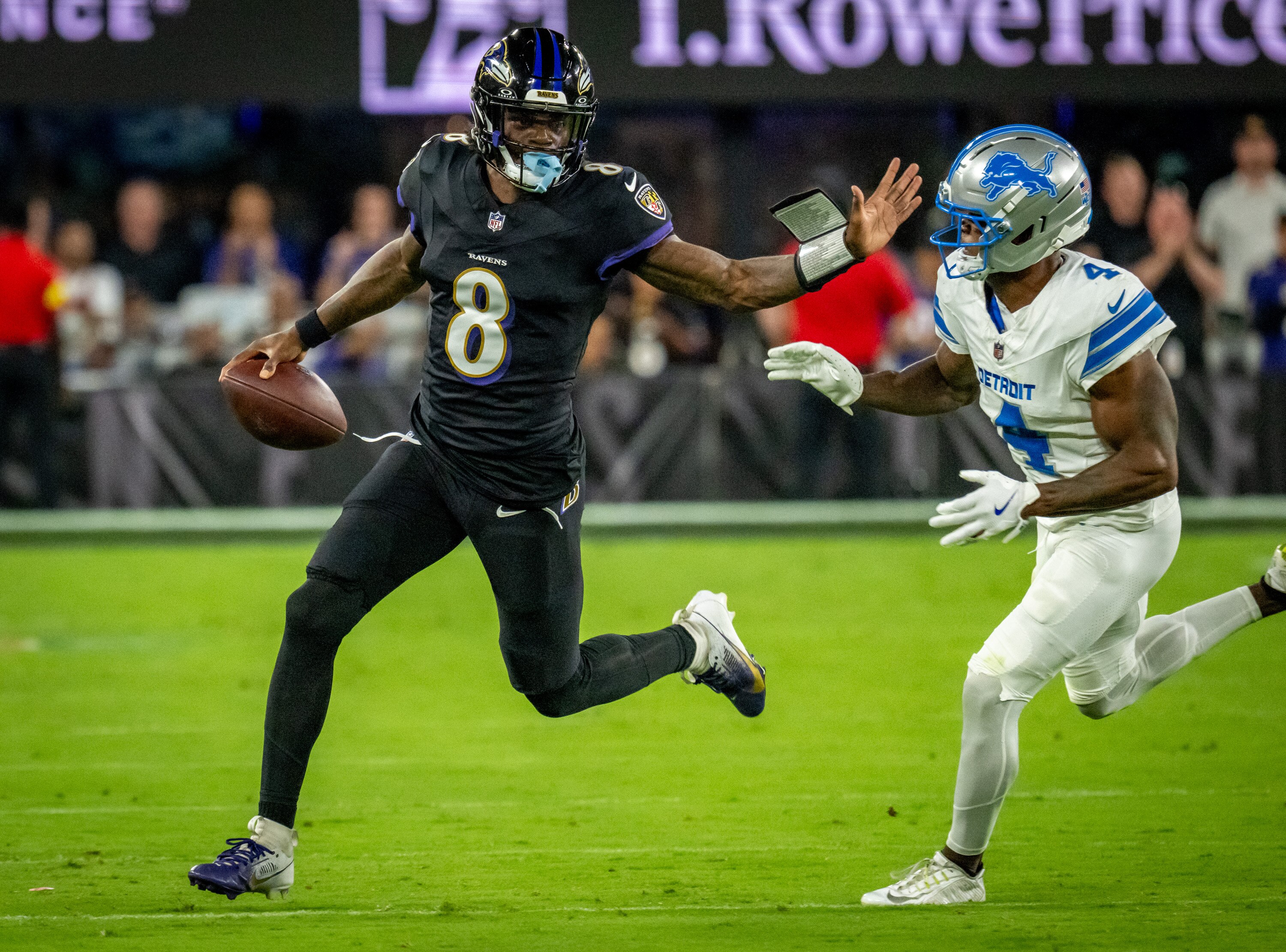 Ravens quarterback Lamar Jackson runs for a 13-yard gain in the third quarter against the Detroit Lions in Week 3.