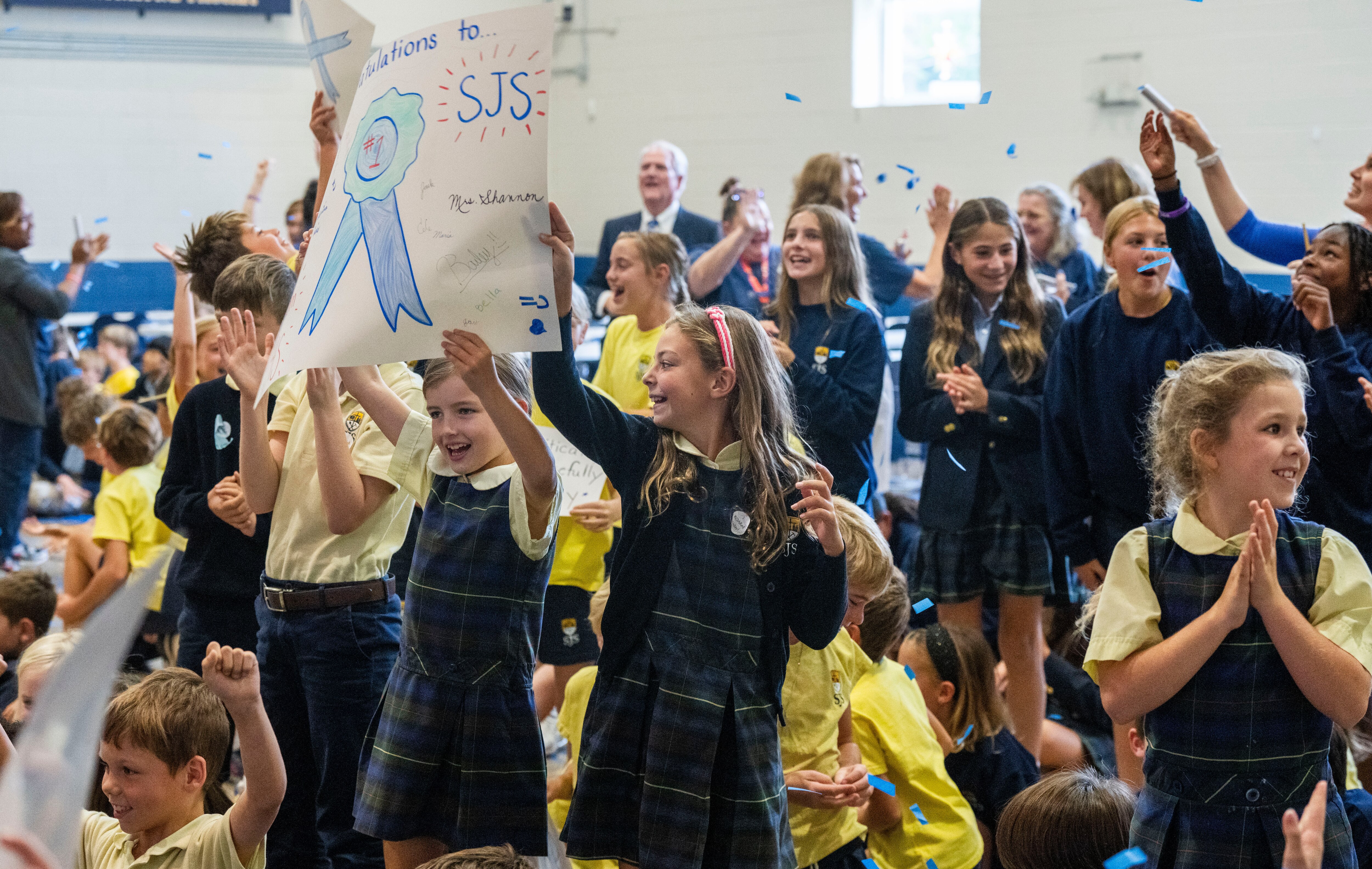 Students at St. Joseph School Cockeysville celebrated their Blue Ribbon win with cheers, signs and confetti.